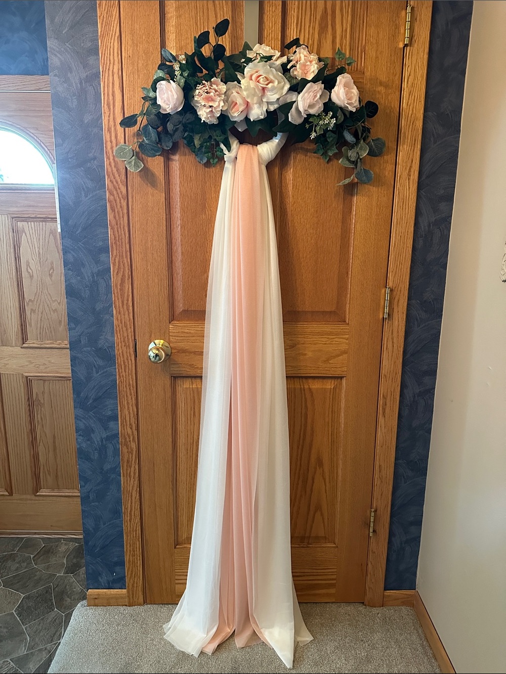 24" Floral Swag with blush roses with blush and white fabric drop on wire ring